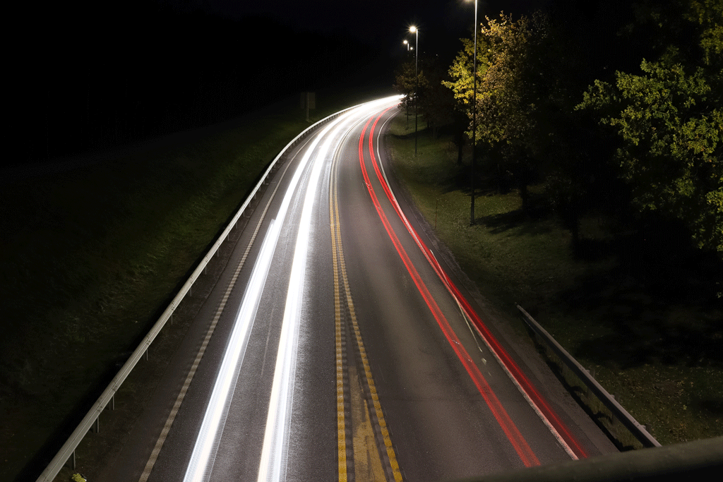 Nighttime long exposure image of road